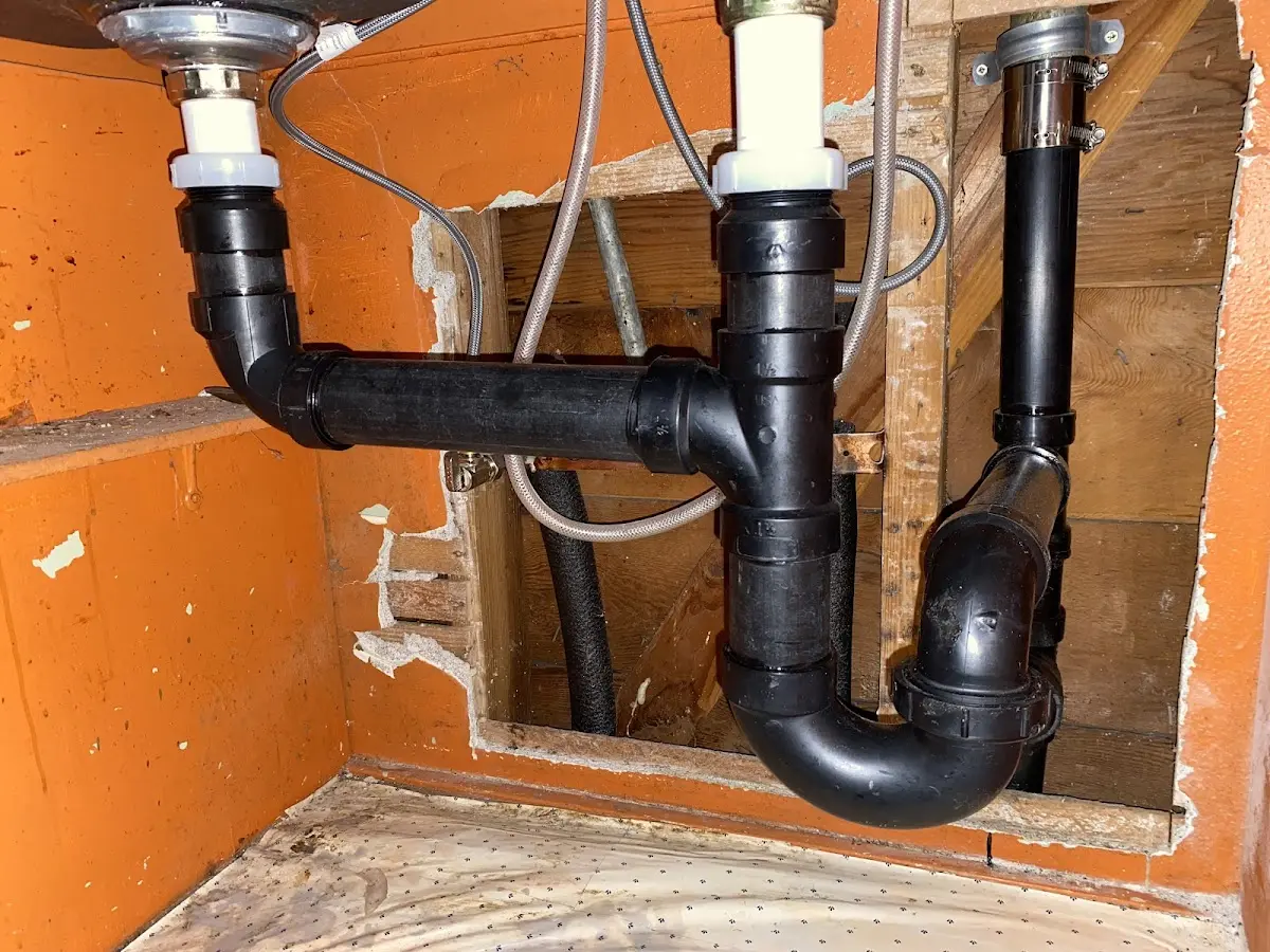 Professional Garbage Disposal Repair equipment and tools on the job in Sunrise Manor